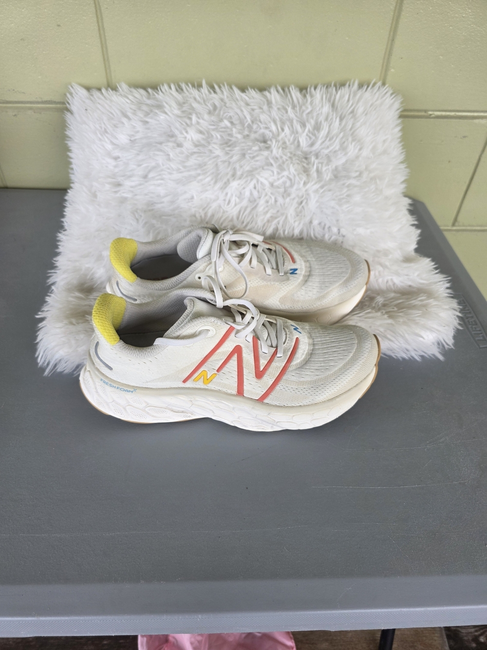 New Balance White Athletic Running Shoes with Coral and Yellow Accents